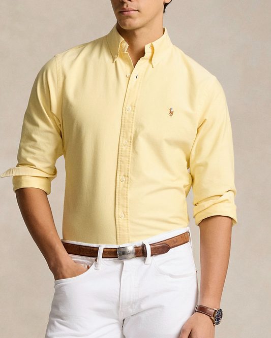 Polo Ralph Lauren Slim Fit Oxford Shirt in yellow, displayed on a model.